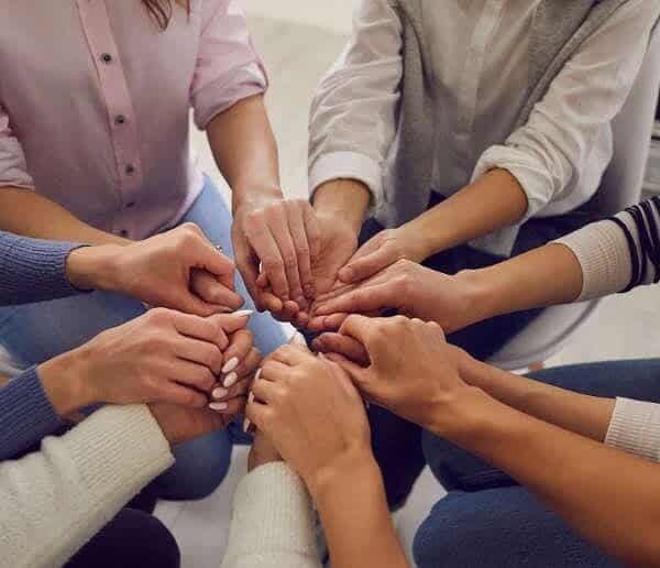 Group Of People Holding Hands