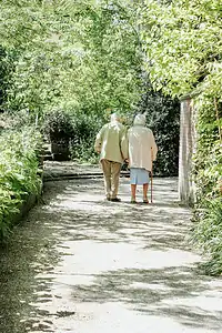 Elderly couple walking in the park