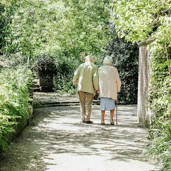 Elderly couple walking in the park